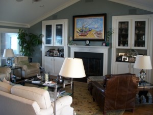 Custom TV Installation above fireplace with TV recessed flush with wall. System Includes Vutec Art Screen Masking System.